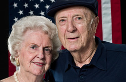 Elderly Couple with American Flag